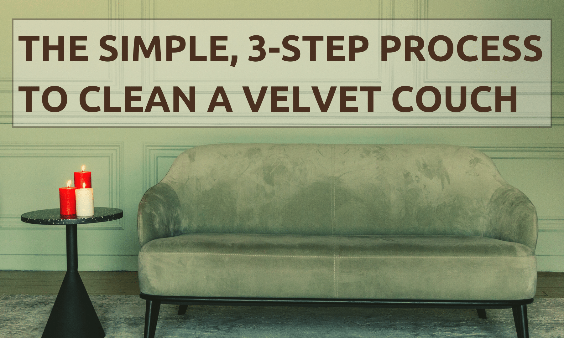 A green sofa sits against a green wall. A small, dark, circular table text to the couch has two red candles and one white candle on it. Text reads: "The Simple, 3-Step Process To Clean A Velvet Couch."